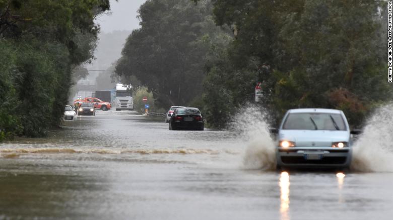 Flash flooding in Italian city turns roads into rivers