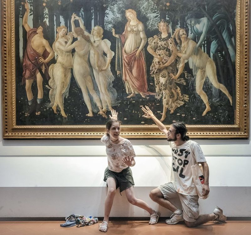 In July, protesters from Ultima Generazione glue their hands to the glass covering of Sandro Botticelli's Primavera. Laura Lezza / Getty Images