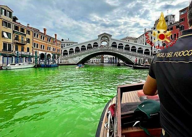 Stretch of Venice’s Grand Canal mysteriously turns phosphorescent green